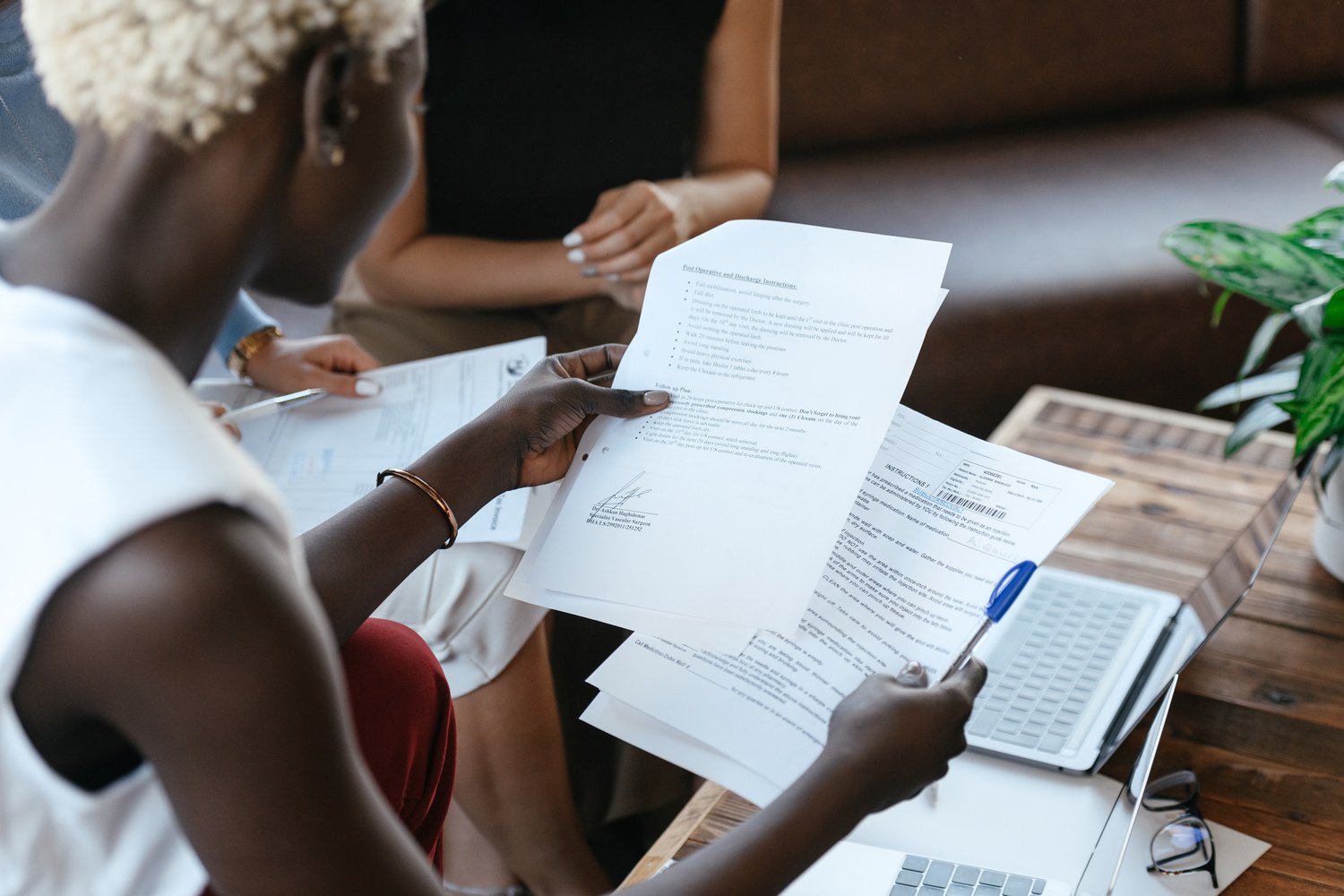 Black woman reading information of important document